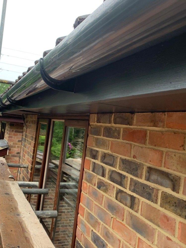 New black half-round gutter