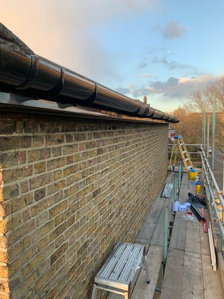 New guttering fitted from scaffold