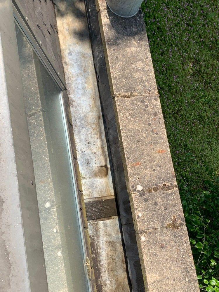 Same parapet gutter, cleared
