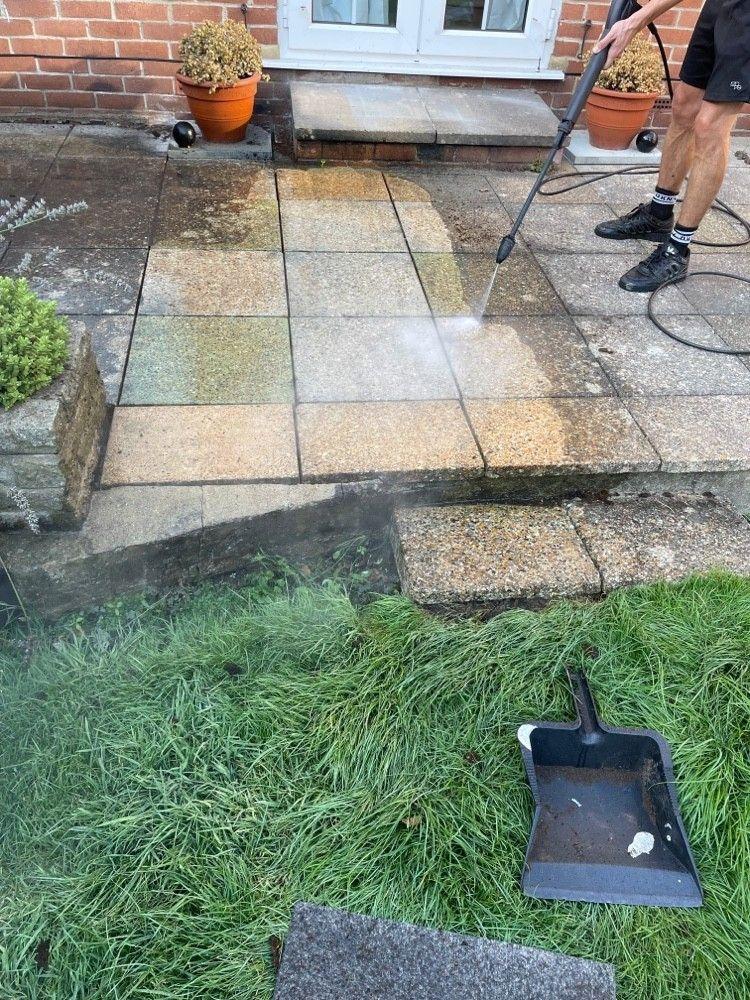 Patio pressure wash in progress