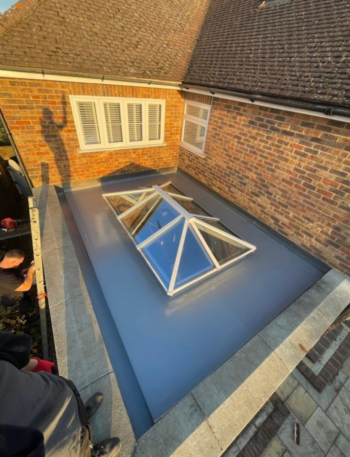 Flat roof repair in progress