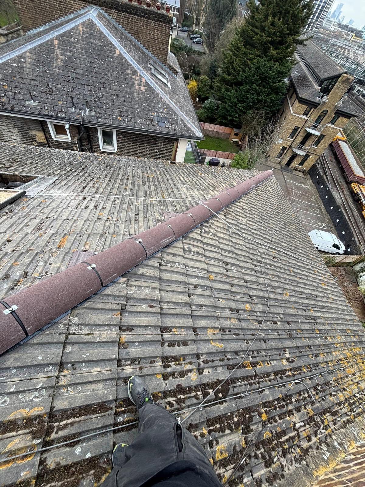 Ridge and leadwork repair