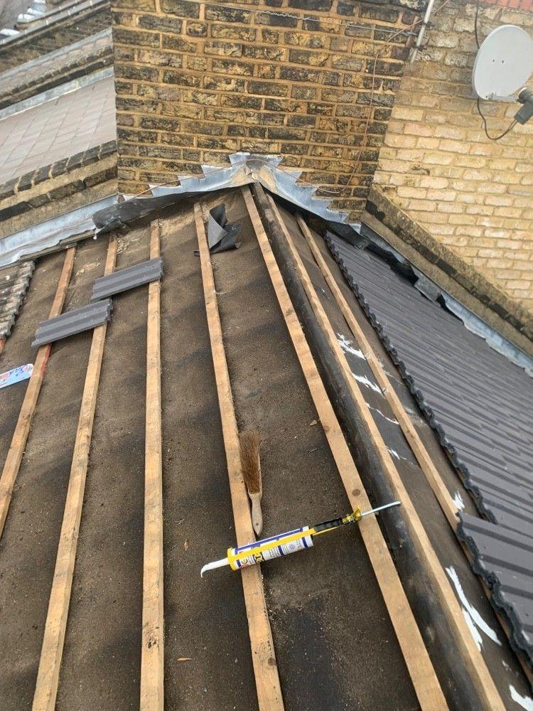 Re-tiling: old tiles stripped, new battens